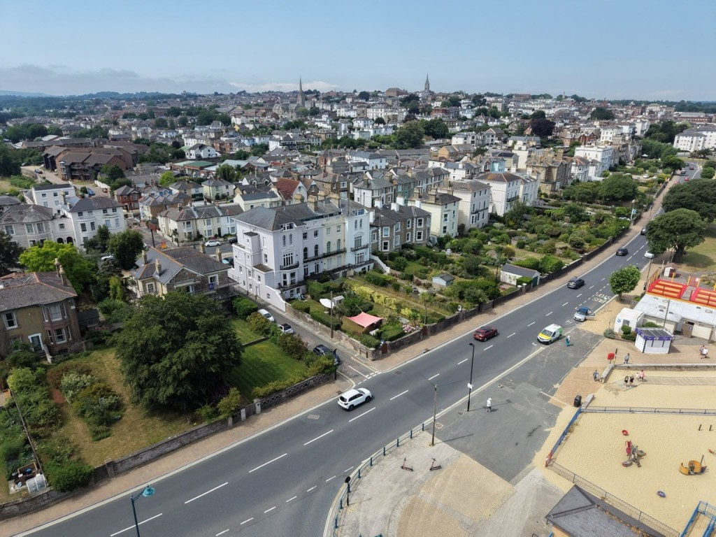 Lot: 81 - FREEHOLD SEAFRONT FIVE STOREY HOME WITH PARKING AND BEAUTIFUL BEACH AND SEA VIEWS - A View with the Town of Ryde Behind
